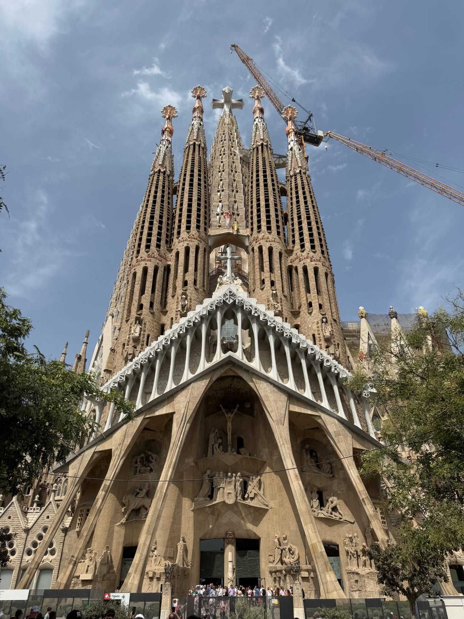 The towers, crane and all, from the plaza below.
